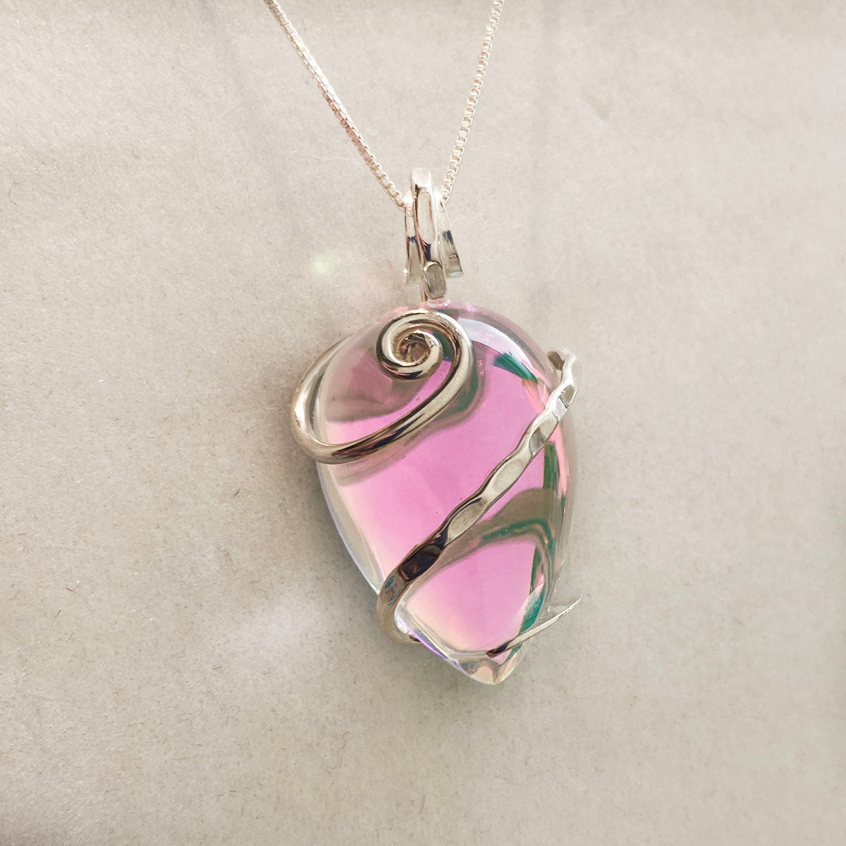 Handmade Pendant wire authentic wrapped in silver wire and aluminum pink wire. One of a kind!!